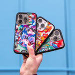 Magsafe-compatible phone cases showcasing beautiful Ukrainian designs by Victoria Radochyna for War Child. | iPhone 15 Pro Max,iPhone 15 Pro,iPhone 14 Pro Max,iPhone 14 Pro,iPhone 15 Plus,iPhone 15,iPhone 14 Plus,iPhone 14